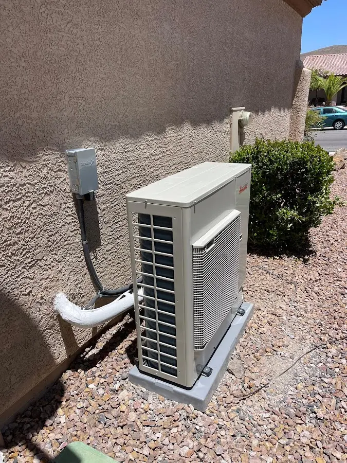 Residential air conditioning condenser unit in Monmouth